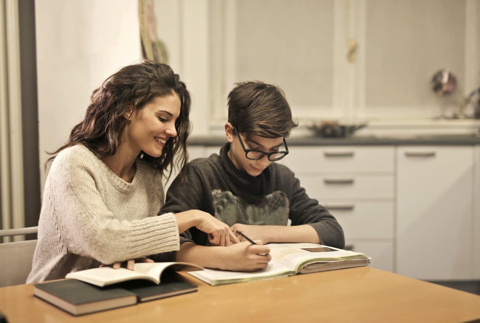 The Right Mentor - Tutor Teaching A Student
